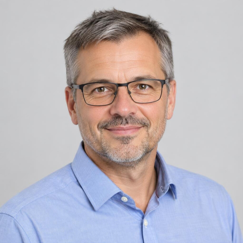 Studio portrait of a professional man with glasses